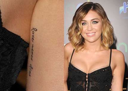 Miley Cyrus - significato tatuaggi - Love never dies braccio