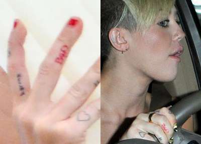Miley Cyrus - significato tatuaggi - Bad dito