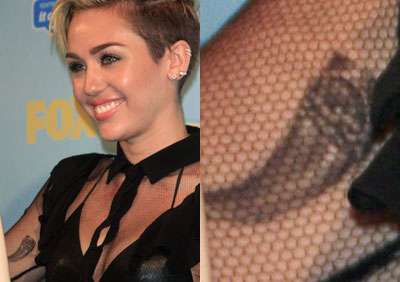 Miley Cyrus - significato tatuaggi - Dente braccio