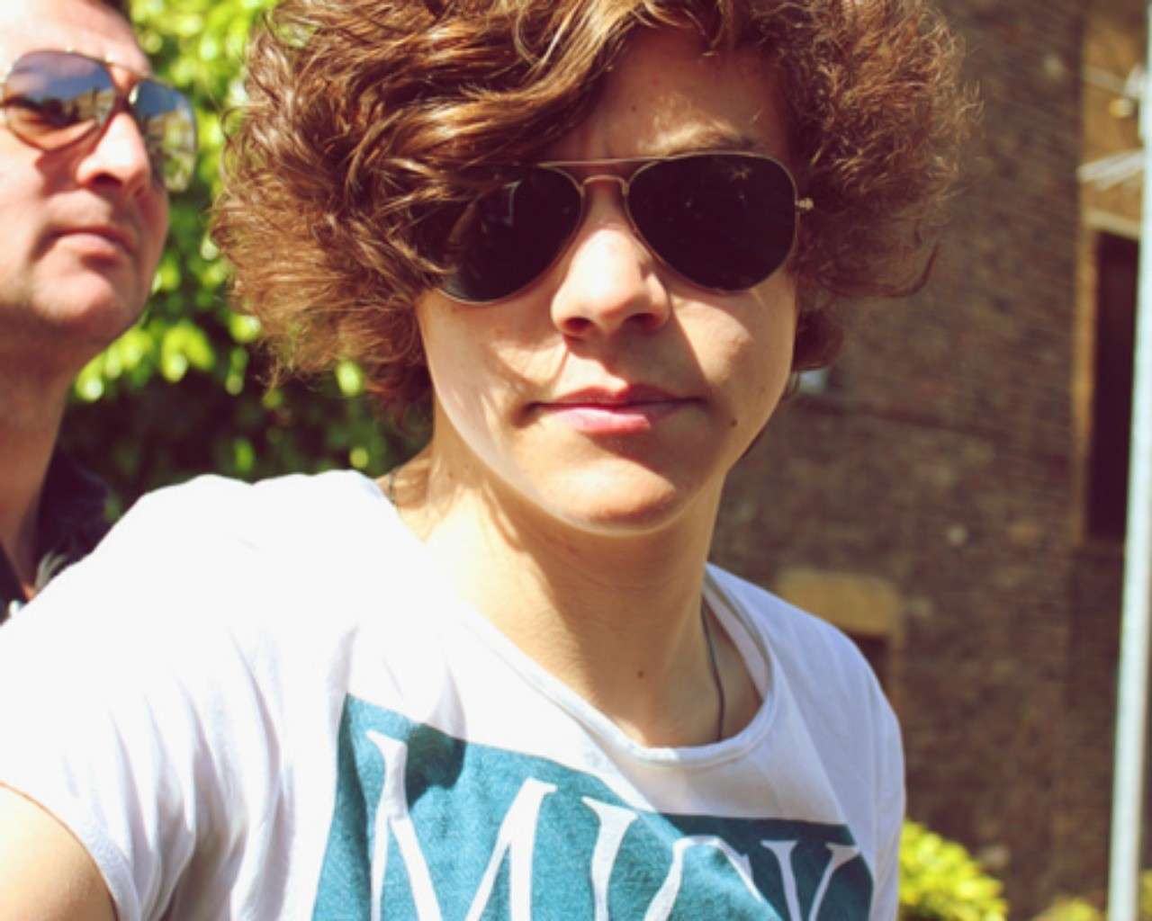 Harry Styles con occhiali da sole