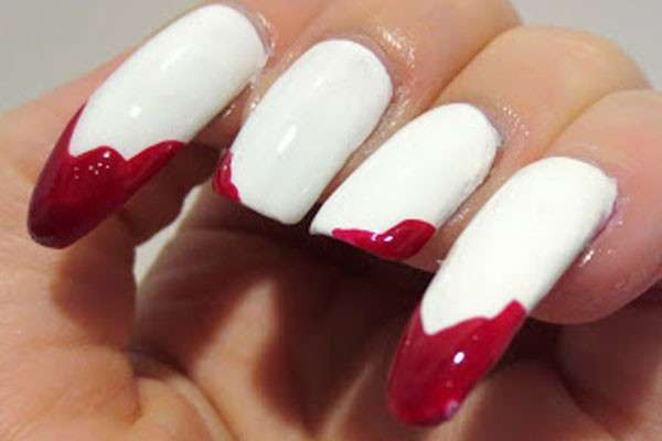 Nail art bianca e rossa stile Chica Vampiro