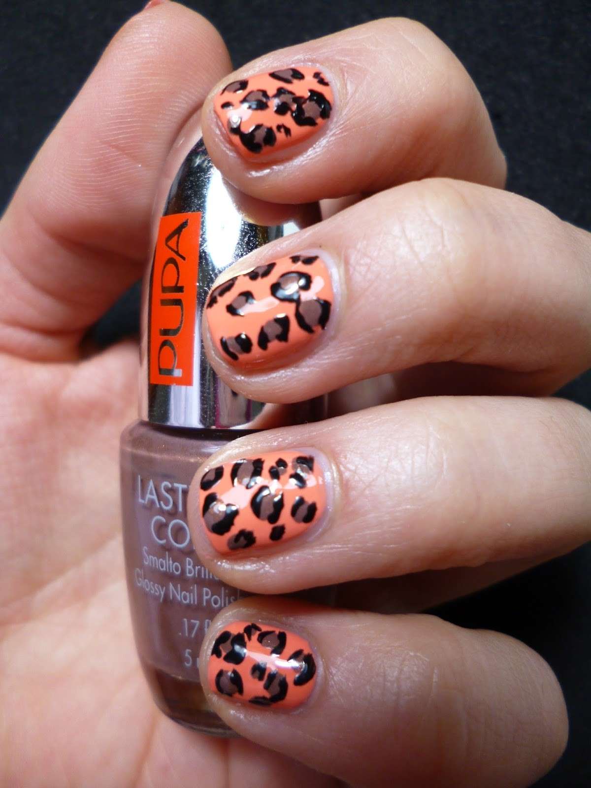 Nail art arancione leopardata