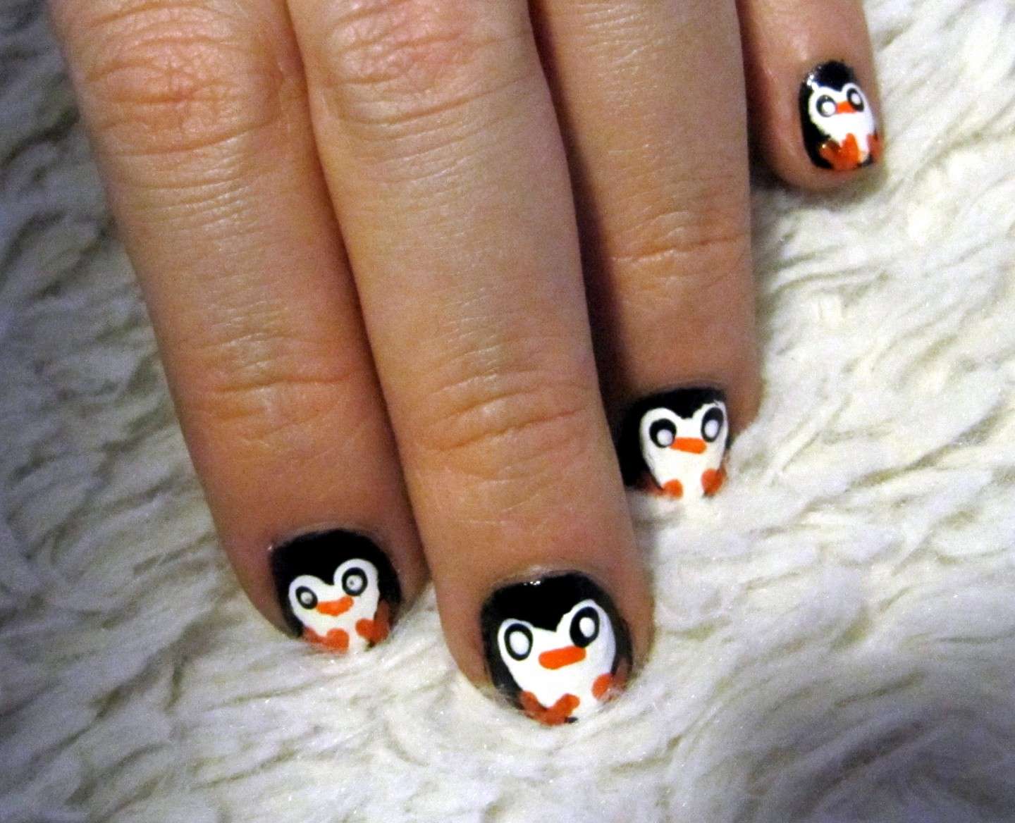 Nail art con pinguino