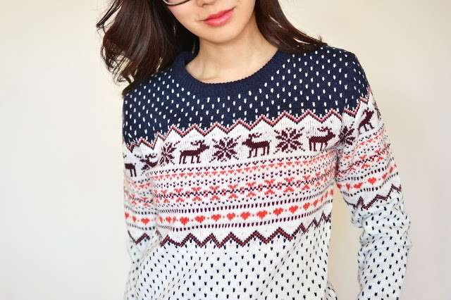 Maglione natalizio con le renne