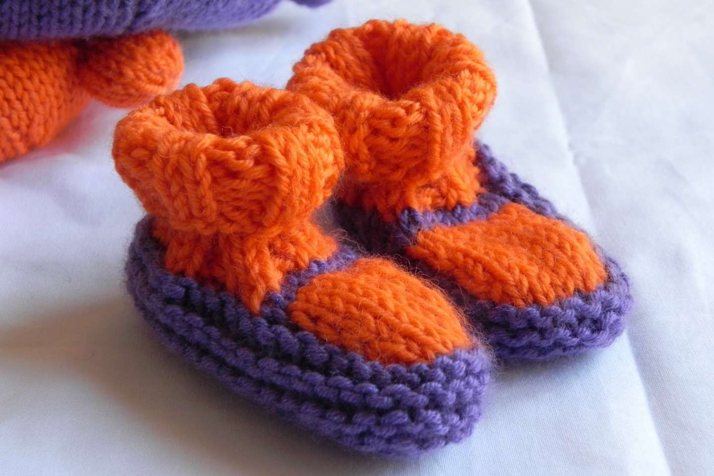 Mini babbucce viola e arancioni