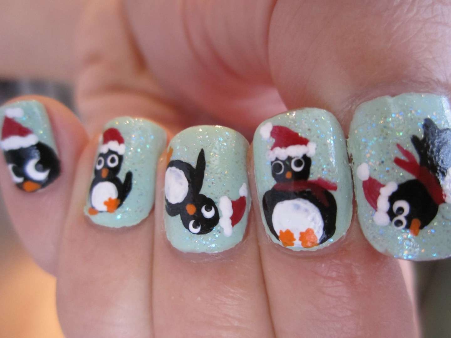 Divertente nail art con pinguino