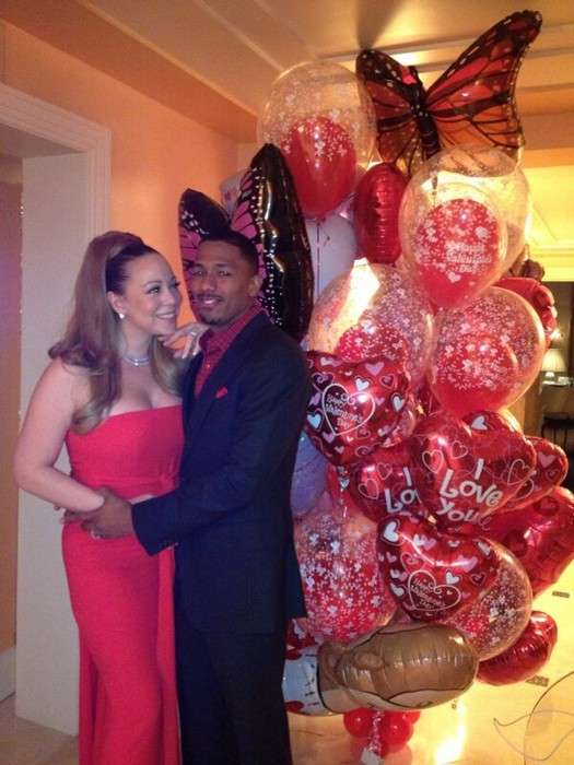 Mariah Carrey e Nick Cannon con i palloncini rossi