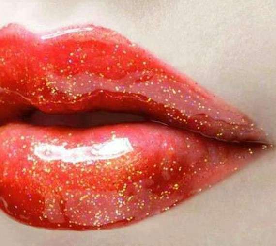 Gloss rosso con glitter