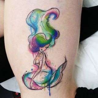Tatuaggio watercolor con sirena