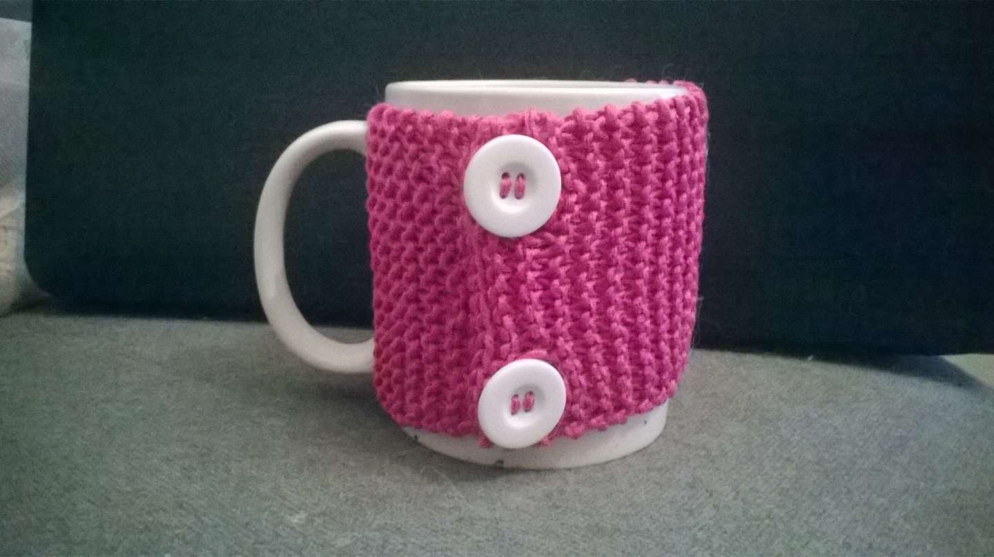 Copri mug rosa con bottoni