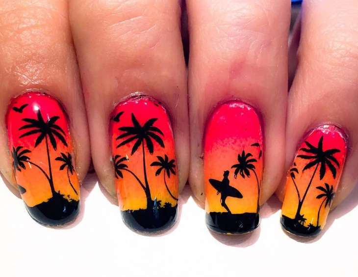 Nail art con tramonto e tavola da surf