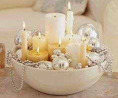 Centrotavola con candele e catenelle argento
